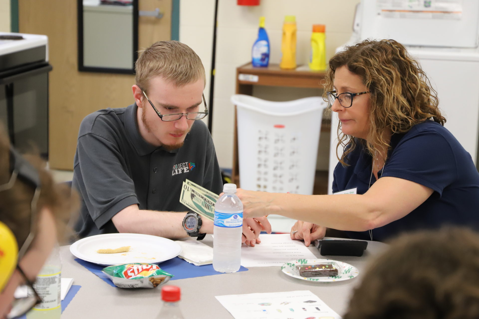 Project Life student working with educator